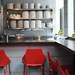 Dishes are stacked on open shelving at the Lunch Room at the Kerrytown Market & Shops. Melanie Maxwell | AnnArbor.com